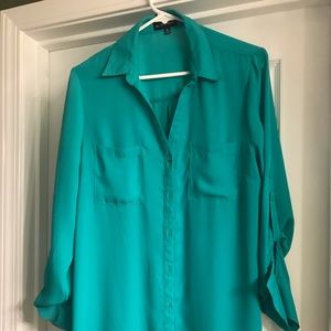 Green/teal button up top